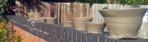 Pottery Drying on a Wall